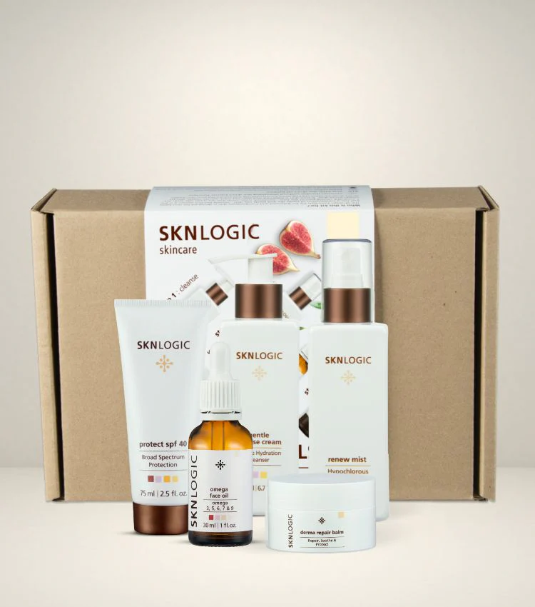 SKNLogic - Essentials Kit - Skin Rescue (Gentle Cleanse Cream, Renew Mist Omega Face Oil, Derma Repair Balm, Protect SPF 40 and Cosmetic Bag)