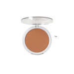 Round white compact containing tan powder with a clear lid, open to show the makeup shade Tan