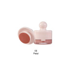Phoera cream blush in shade Petal (05) with pink jar and sponge applicator.