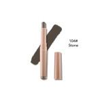 Lipstick in shade 104 Stone with its cap removed, shown beside a dark brush stroke on a white background