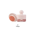 PHOERA lip tint bottle in shade 01 Pataya with the compact applicator sponge beside it.
