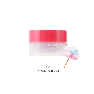 Lip sleeping mask jar by Phoera with pink lid, shade '03 Spun Sugar', shown beside a pink-blue cotton candy prop.