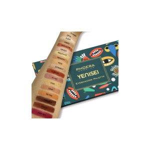 Arm showing swatches of 18 nude-to-deep eyeshadows labeled with shade names, beside a colorful Yenisei Eyeshadow Palette box by Phadera Makeup with bold geometric pattern.